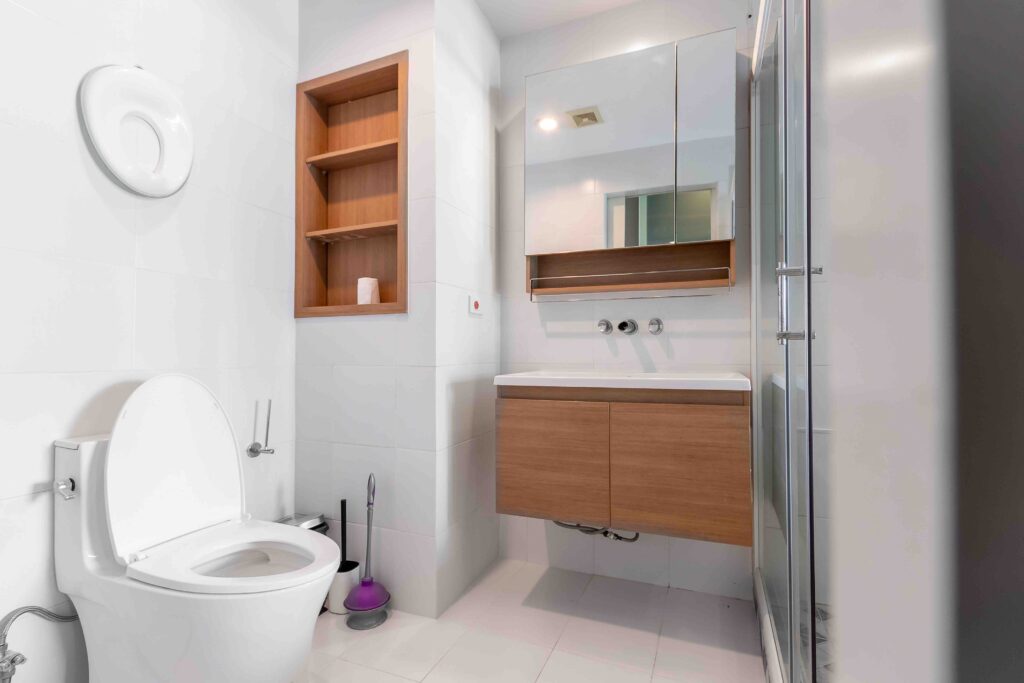 Modern luxury white bathroom interior ,There are marble floor decorated with wooden sink counter