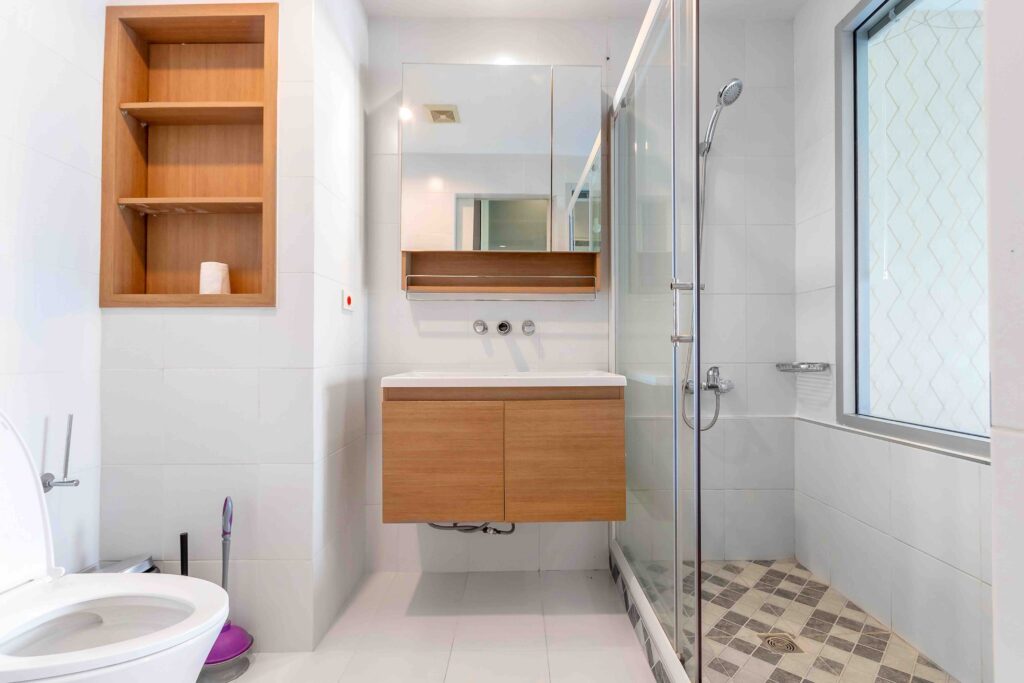 Modern luxury white bathroom interior ,There are marble floor decorated with wooden sink counter