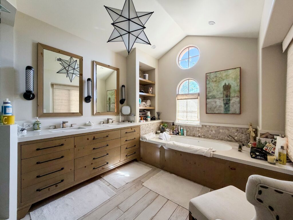 A double vanity with clean-lined cabinetry for better storage