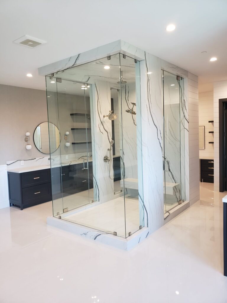 walk in shower remodel Los Angeles glass enclosure marble tile luxury bathroom
