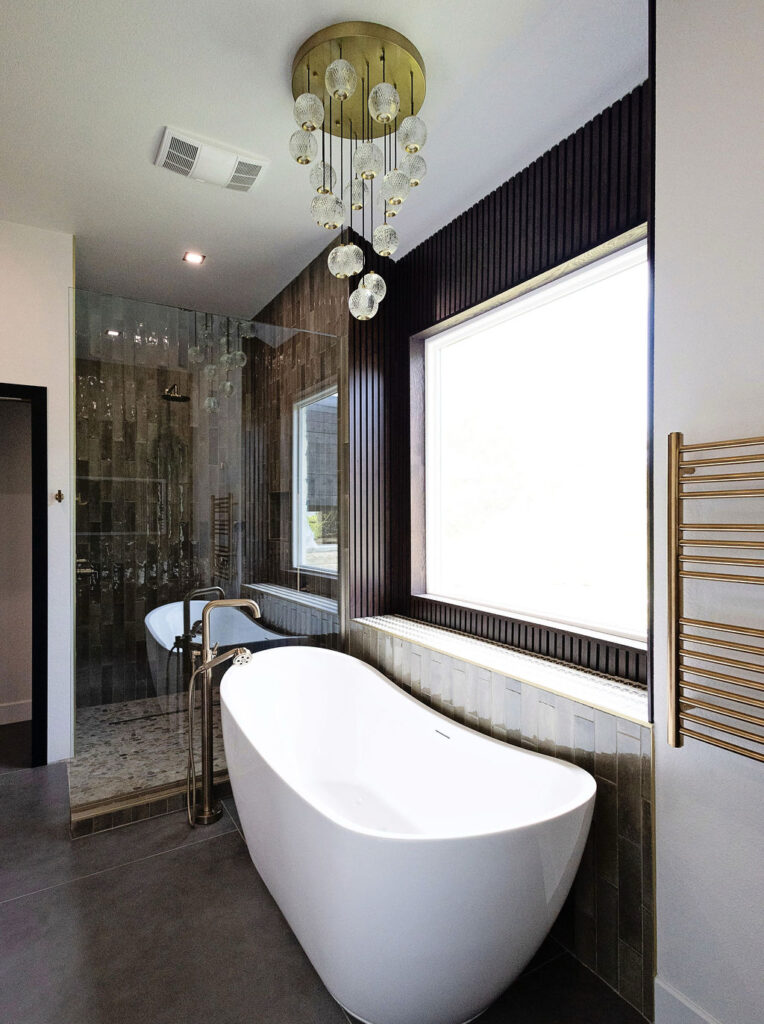 freestanding soaking tub luxury bathroom remodel Los Angeles chandelier walk in shower spa design