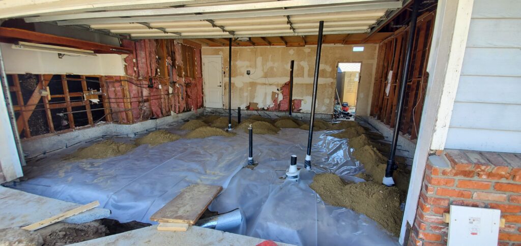exposed plumbing and framing during remodel Los Angeles